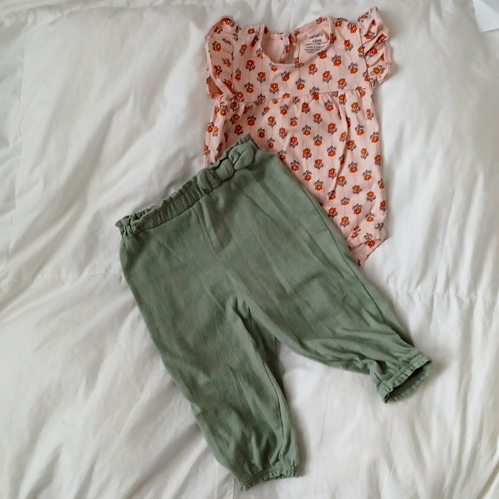 Carters 2 piece set floral top and green pants. Size 12 months.